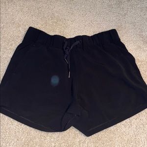 black drawstring lululemon shorts